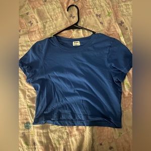 Trendy cropped shirt in a beautiful royal blue color.